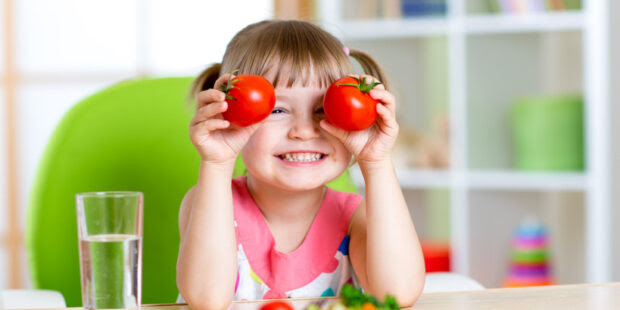 Child with Tomatoes